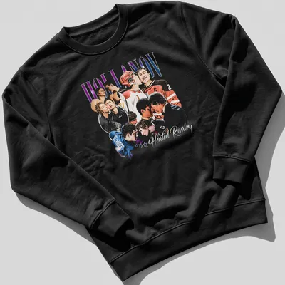 Vintage hockey-themed shirt featuring players and vibrant text — printed on a unisex sweatshirt