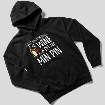 Playful typography with a wine bottle, glass, and paw print design. — printed on a unisex hoodie