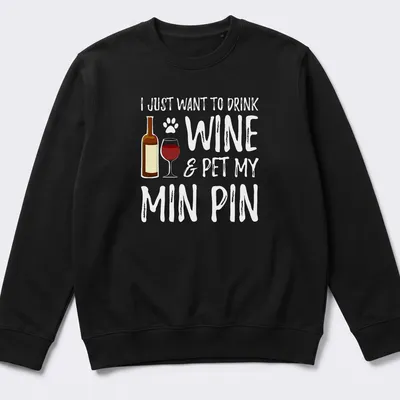 Playful typography with a wine bottle, glass, and paw print design. — printed on a unisex sweatshirt