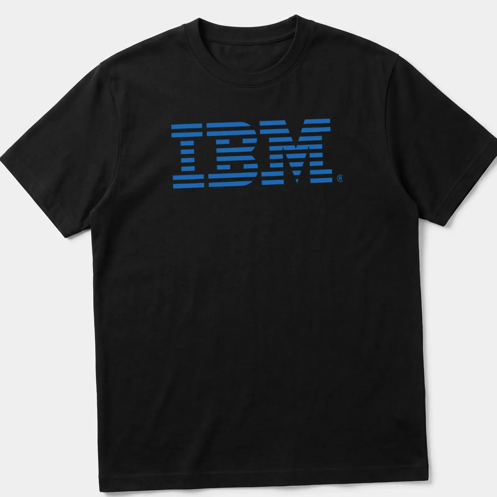 Retro blue IBM logo t-shirt evoking 80s and 90s tech nostalgia — printed on a unisex t-shirt