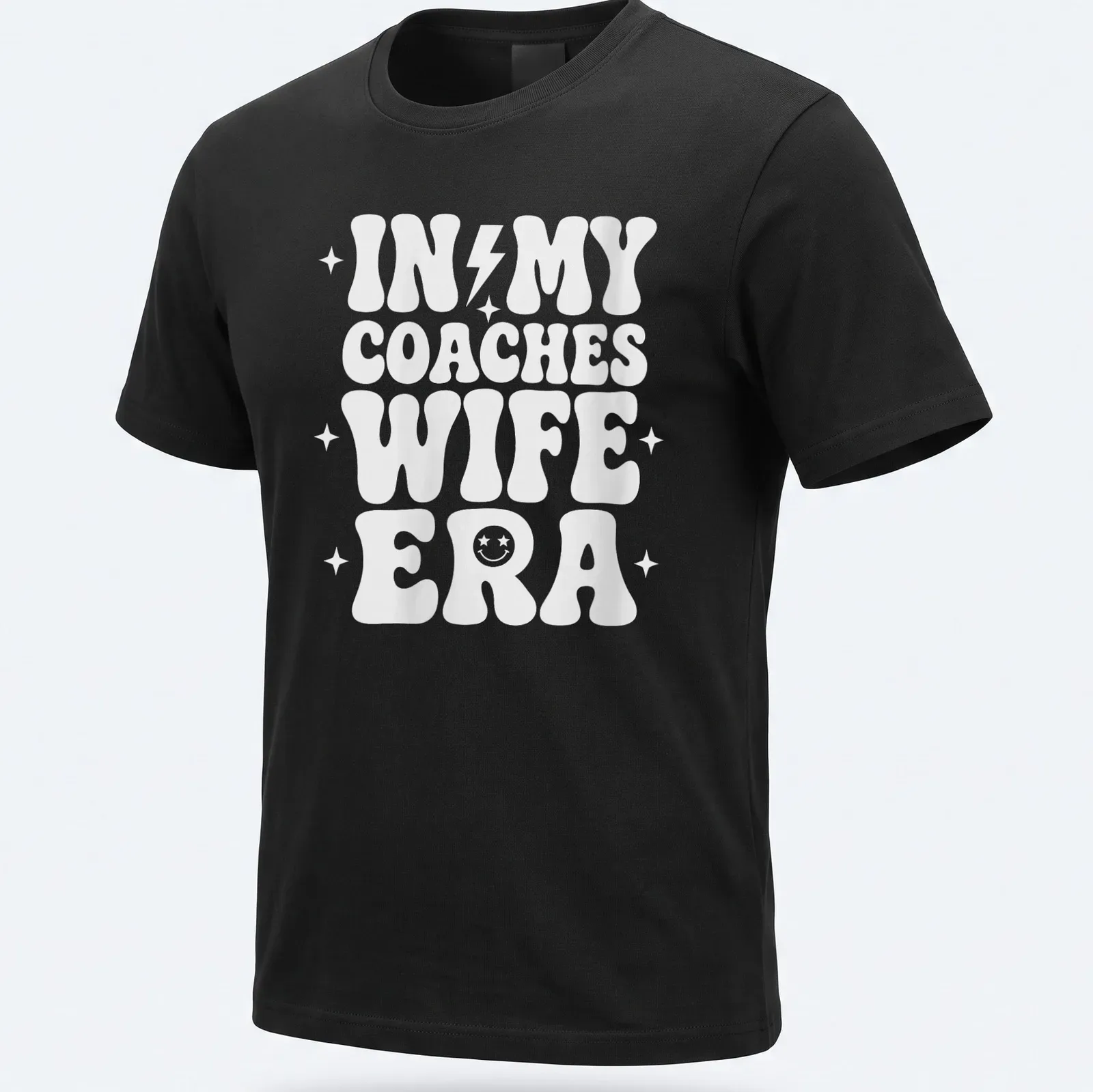 Bold typography t-shirt with IN MY COACHES WIFE ERA text in white — printed on a unisex t-shirt