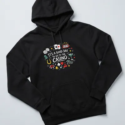 Colorful doodle of casino elements with text about going to the casino — printed on a unisex hoodie