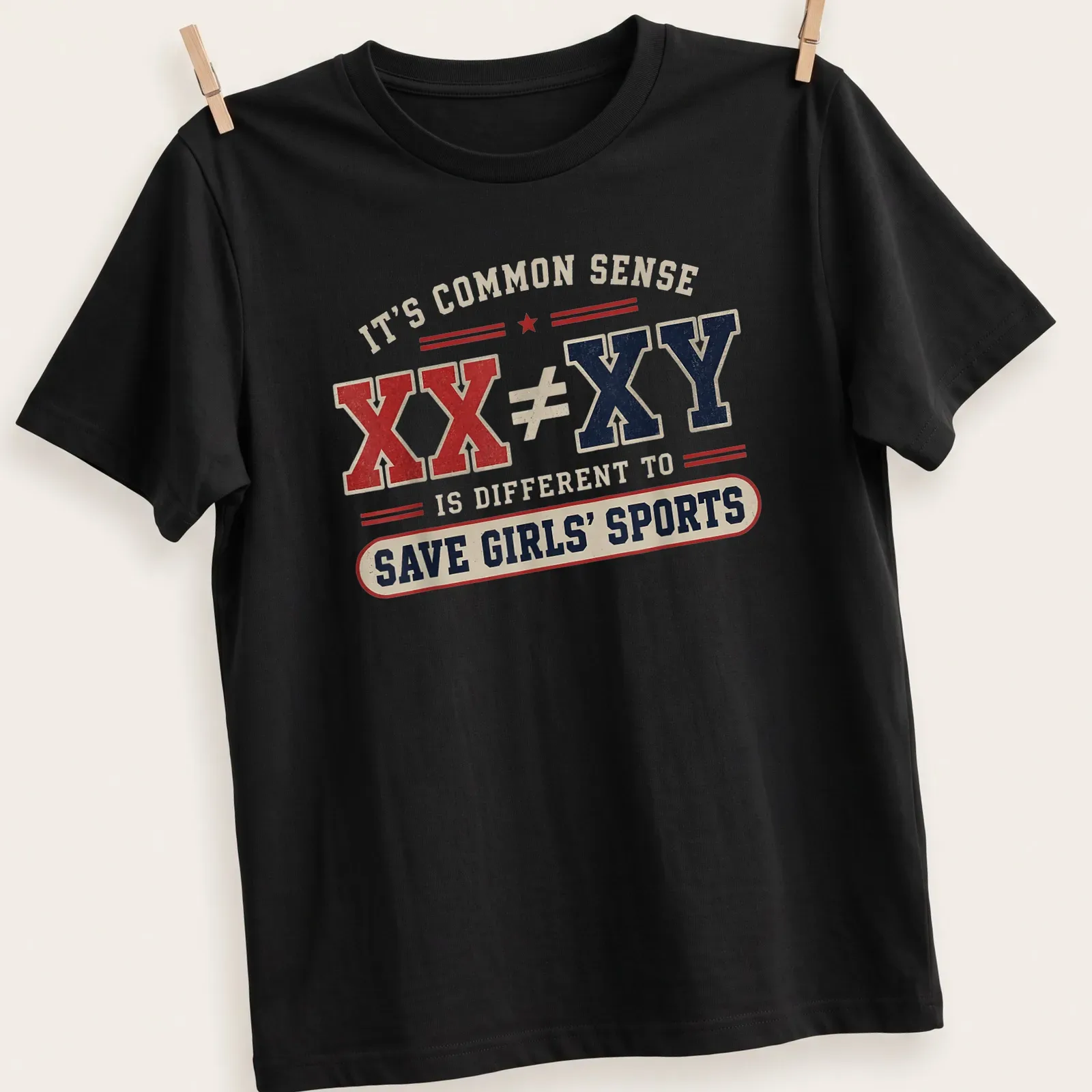 Vintage distressed shirt with bold text about saving girls' sports — printed on a unisex t-shirt
