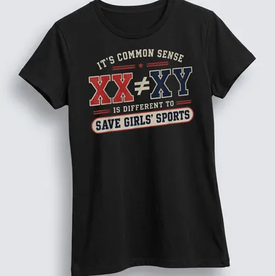 Vintage distressed shirt with bold text about saving girls' sports — printed on a women's shirt