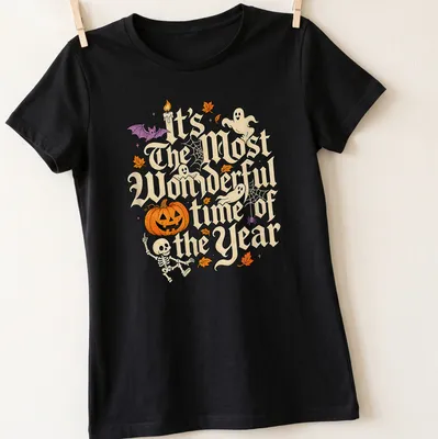 Vintage Halloween shirt with text and Halloween motifs like a pumpkin and ghosts — printed on a women's shirt