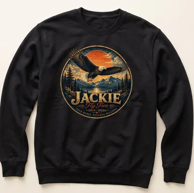 Vintage illustration of a bald eagle with the text honoring Jackie — printed on a unisex sweatshirt