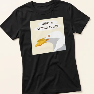 Illustrated gull with the phrase Just A Little Treat in cheerful colors — printed on a women's shirt