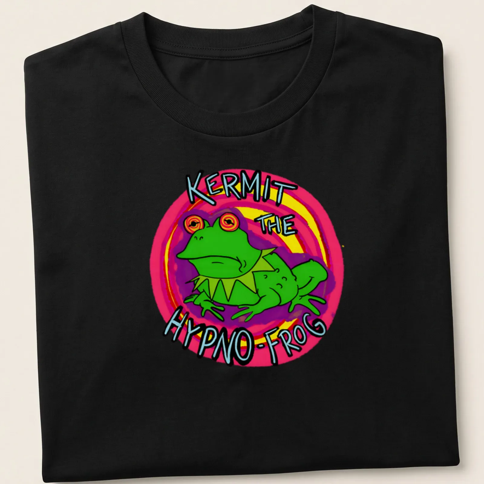 Cartoon illustration of Kermit the Hypno-Frog with colorful text — printed on a unisex t-shirt