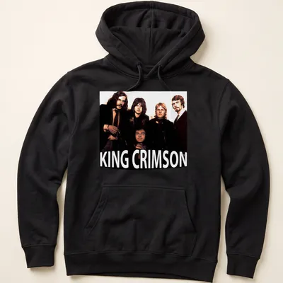 Vintage King Crimson T-shirt with bold lettering in black, white, brown, and beige — printed on a unisex hoodie