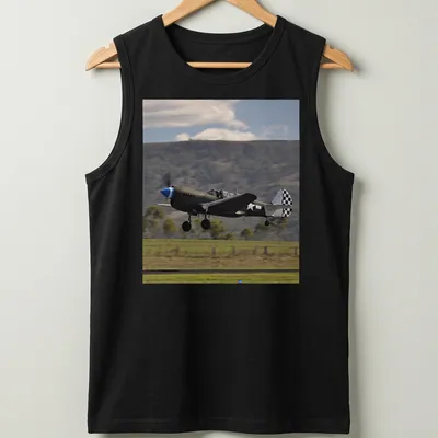 Photographic print of a Kittyhawk airplane taking off against a blue sky — printed on a tank top