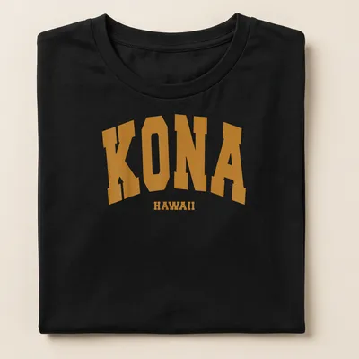 Bold collegiate print of KONA HAWAII in gold and white on triathlon — printed on a women's shirt