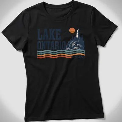 Retro lighthouse sunset illustration on Lake Ontario shirt with navy blue and orange colors. — printed on a women's shirt