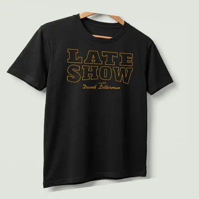 Vintage Late Show with David Letterman t-shirt featuring bold text — printed on a unisex t-shirt (angled view)