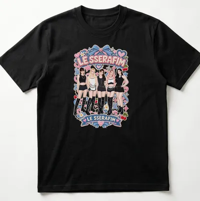 Colorful cartoon design featuring the text LE SSERAFIM and five members of the girl group — printed on a unisex t-shirt