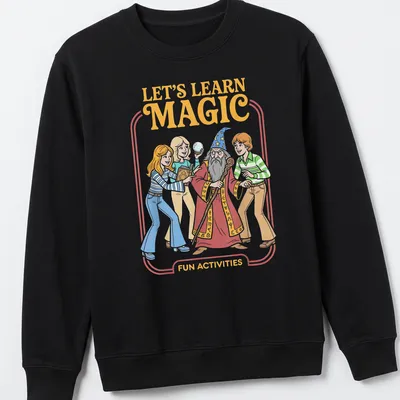 Vintage cartoon wizard with children graphic and colorful text on — printed on a unisex sweatshirt
