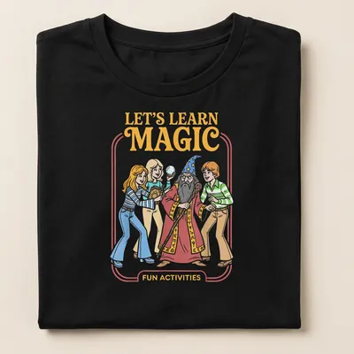 Vintage cartoon wizard with children graphic and colorful text on — printed on a women's shirt