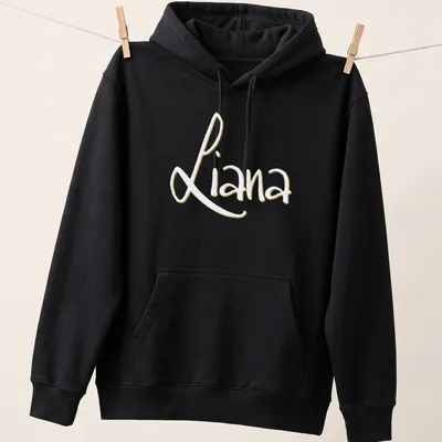 Personalized shirt featuring the name Liana in elegant gold script on white — printed on a unisex hoodie