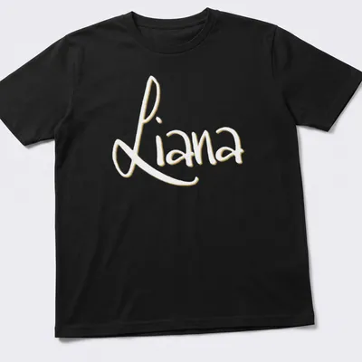 Personalized shirt featuring the name Liana in elegant gold script on white