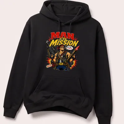 Vintage comic style t-shirt featuring a muscular man with weapons and bold text — printed on a unisex hoodie