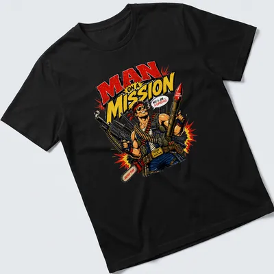 Vintage comic style t-shirt featuring a muscular man with weapons and bold text