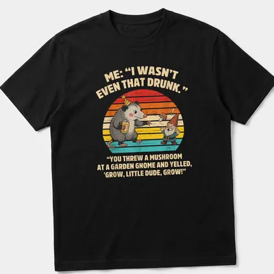 Playful cartoon of a possum and garden gnome with humorous text about mushrooms — printed on a unisex t-shirt
