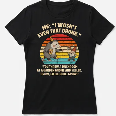 Playful cartoon of a possum and garden gnome with humorous text about mushrooms — printed on a women's shirt