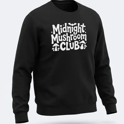 Vintage design featuring mushrooms and text 'Midnight Mushroom Club' in black, white, and purple. — printed on a unisex sweatshirt