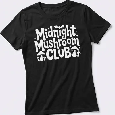 Vintage design featuring mushrooms and text 'Midnight Mushroom Club' in black, white, and purple. — printed on a women's shirt