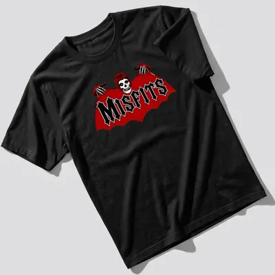 Bold graphic of a skull bat with MISFITS text in red, black, and white — printed on a unisex t-shirt