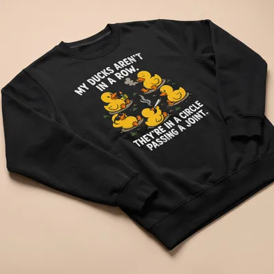 Cartoon ducks in a circle with humorous text about passing a joint — printed on a unisex sweatshirt