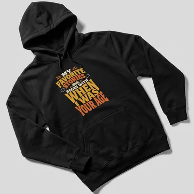Retro T-shirt featuring a storytelling quote in bold, warm colors. — printed on a unisex hoodie