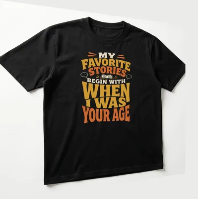 Retro T-shirt featuring a storytelling quote in bold, warm colors. — printed on a unisex t-shirt (angled view)