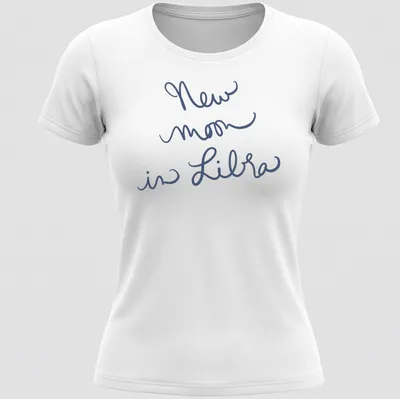 Handwritten script of 'New moon in Libra' on a navy blue — printed on a women's shirt