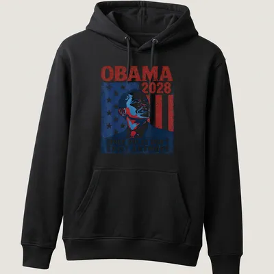 Vintage distressed Obama 2028 shirt with American flag design and bold text — printed on a unisex hoodie
