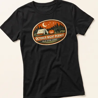 Vintage design featuring a tent, pumpkin, and black cat with text about October nights. — printed on a women's shirt