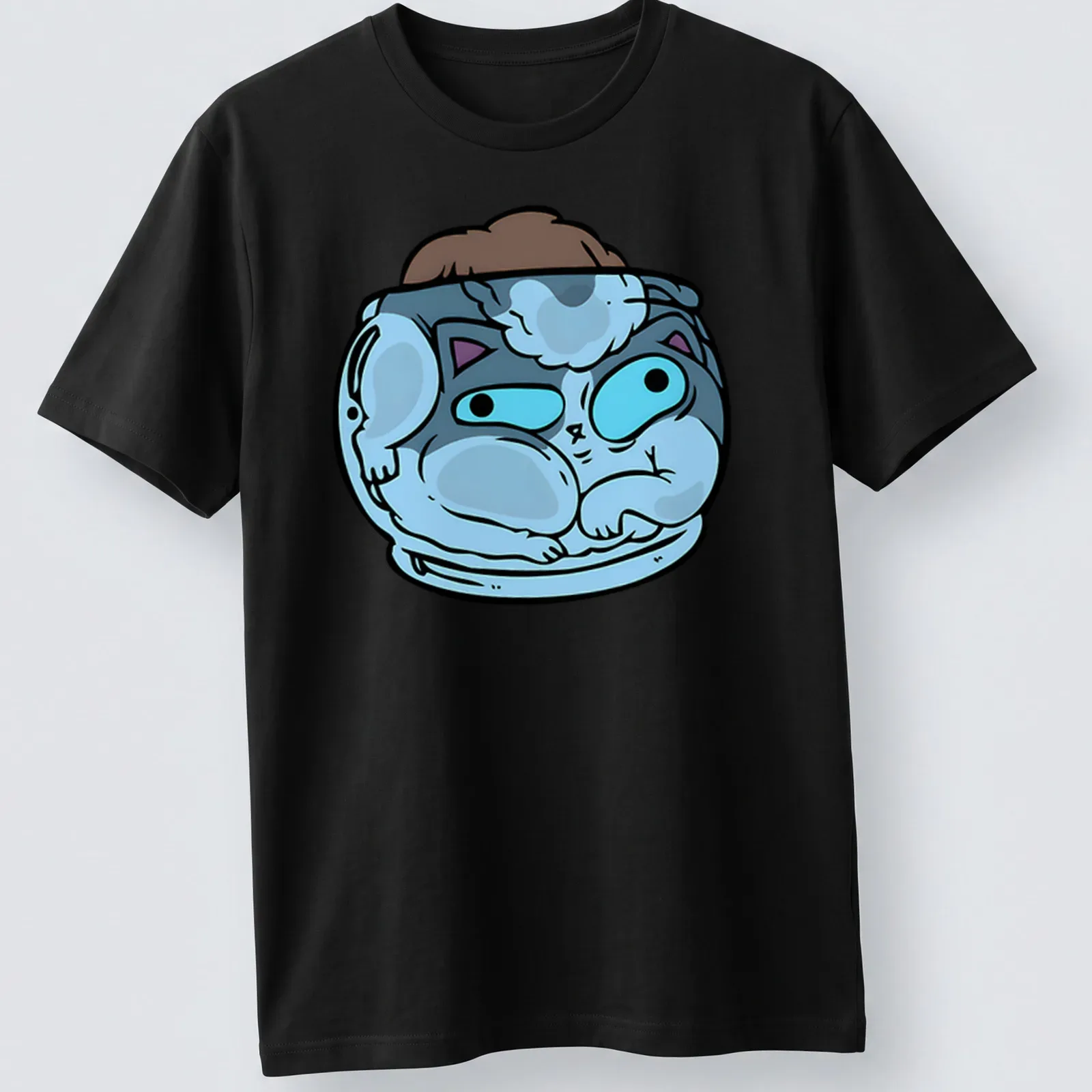 Kawaii design of a cat curled up in a tiny bed with soft colors — printed on a unisex t-shirt