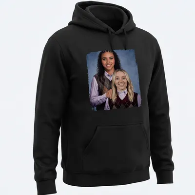 Photographic print of two women in basketball sweaters, featuring vibrant colors. — printed on a unisex hoodie