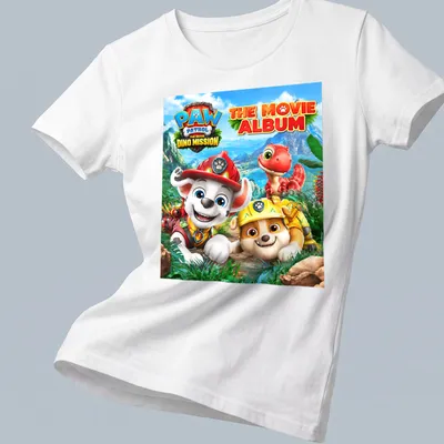 Colorful cartoon design featuring Paw Patrol characters and a dinosaur. — printed on a women's shirt