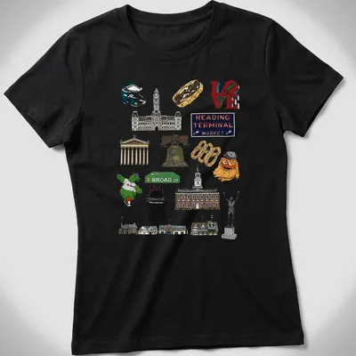 Collage illustration of Philadelphia landmarks in green, yellow, red, blue, brown, and white — printed on a women's shirt