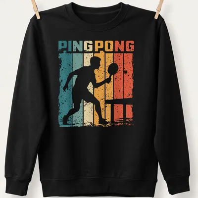 Vintage distressed t-shirt featuring a table tennis player with bold PING PONG text. — printed on a unisex sweatshirt