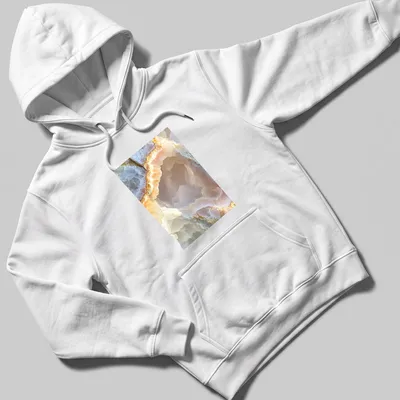 Natural photograph of a pink quartz geode showcasing intricate patterns in pink and cream. — printed on a unisex hoodie