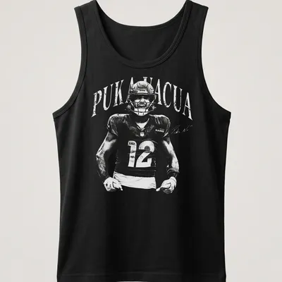 Vintage monochrome shirt featuring Puka Nacua, a football player for the Rams — printed on a tank top