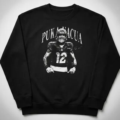 Vintage monochrome shirt featuring Puka Nacua, a football player for the Rams — printed on a unisex sweatshirt