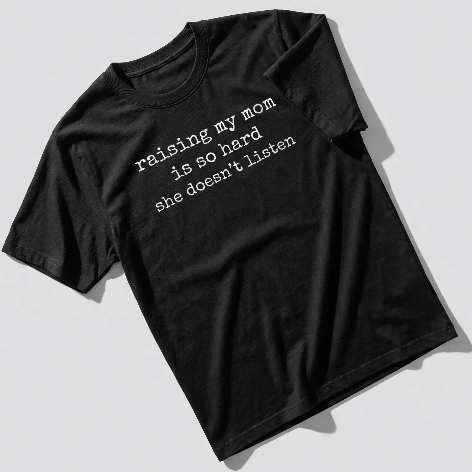Humorous t-shirt featuring the phrase about raising a mom who doesn't listen — printed on a unisex t-shirt