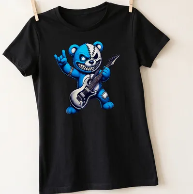 Cartoonish rock guitar bear with a wild smile in blue, black, and grey — printed on a women's shirt