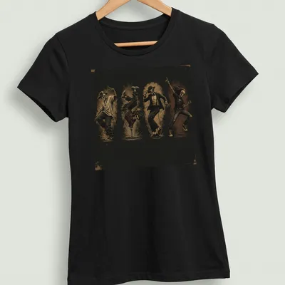 Vintage distressed t-shirt featuring dancing skeletons in black and cream — printed on a women's shirt