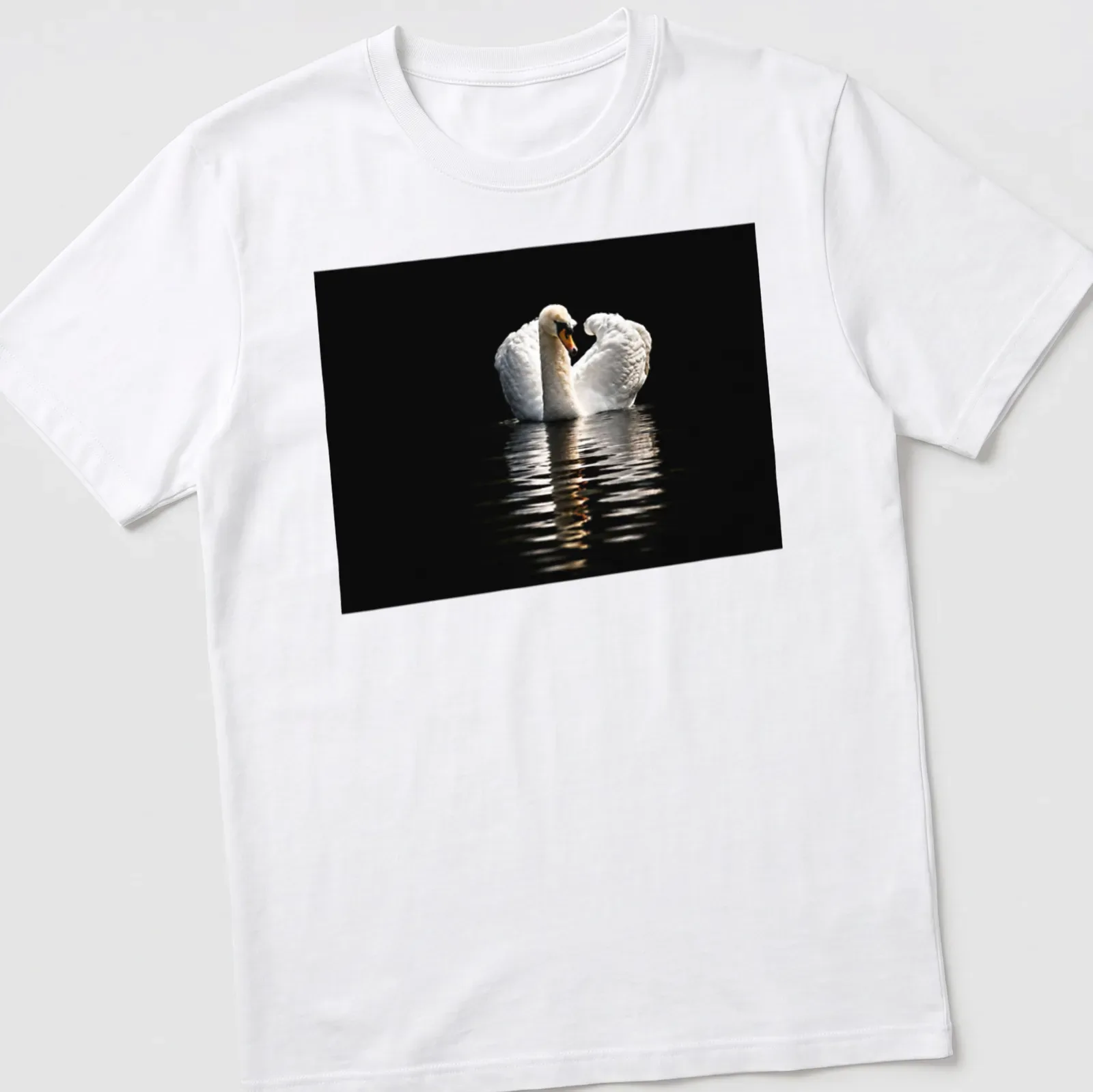 Photographic print of a solitary swan on dark waters in black and gray — printed on a unisex t-shirt