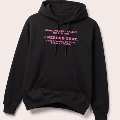 Bold slogan t-shirt featuring playful text in pink and white — printed on a unisex hoodie