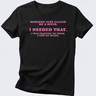 Bold slogan t-shirt featuring playful text in pink and white — printed on a women's shirt