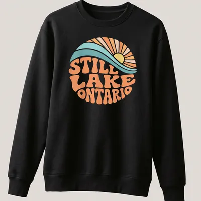 Retro wave design featuring a sunrise over Lake Ontario with vibrant colors — printed on a unisex sweatshirt